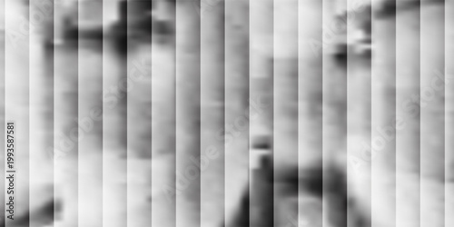 Texture of transparent corrugated glass in gray colors. Translucent volumetric striped plastic background