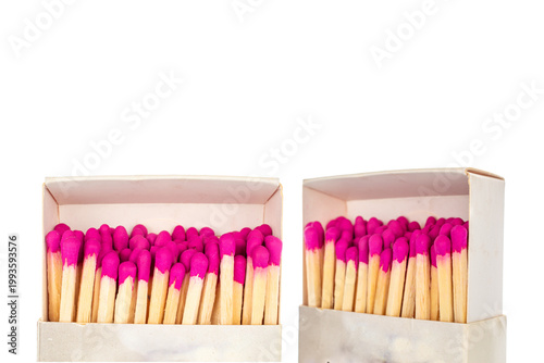 Wooden matches in paper boxes isolated on white background, close-up.