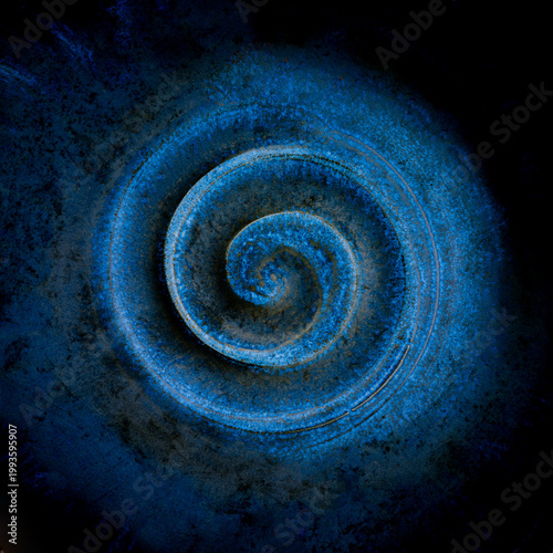 Swirling blue pattern forms a spiral design against a dark backdrop