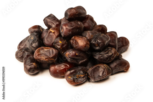 Dried dates isolated on white background. Top view.