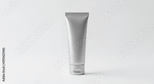 Silver cosmetic tube on white background