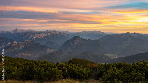 view from peak of Zwiesel over the Chiemgau and Berchtesgaden alps at sunset, bavaria, germany