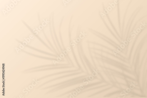 Blurred beautiful foliage tropical palm leaves shadow on beige wall background, Natural coconut leaf shadow overlay on sand color as summer backdrop, beauty, cosmetic, skincare, product presentation