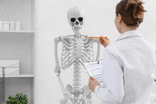 Female doctor with clipboar...