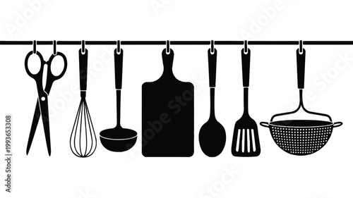 Kitchen utensils hanging on a rack