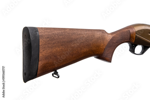 Wooden shotgun stock with a black rubber recoil pad isolated on a white back