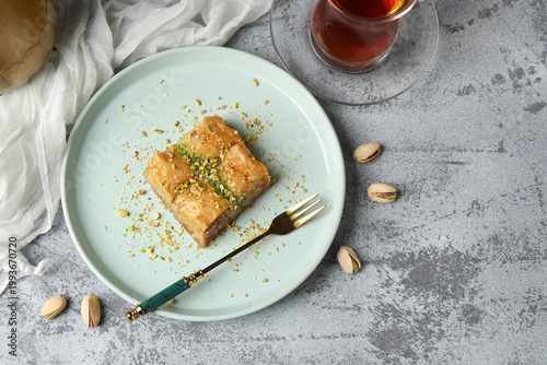 Plate with tasty baklava on...
