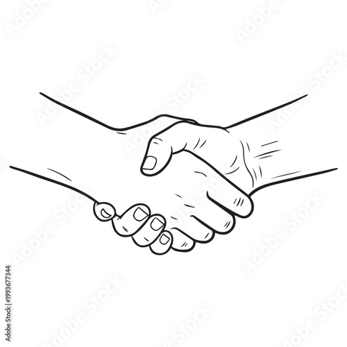 Handshake between two people symbolizing agreement and partnership in a business context.