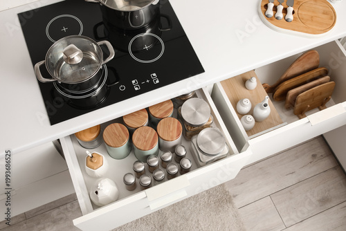 Open kitchen drawers with d...