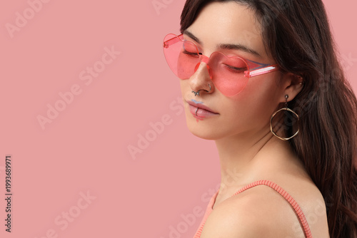 Cool young woman with face ...
