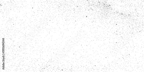 Abstract background with scattered grey particles and dust elements on a white surface for modern graphic design projects