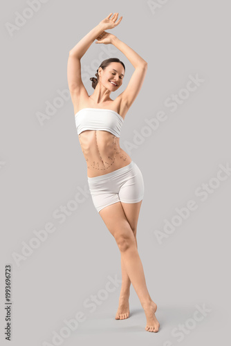 Young woman in underwear wi...