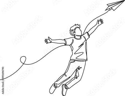 man jumping in air with paper airplane  carefree joyful moment