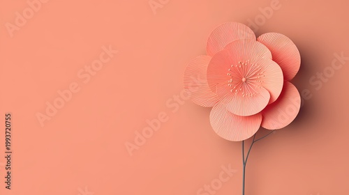 Creative 3D paper flower with pleated petals in soft peach color, minimalist flat lay floral composition on warm pastel background