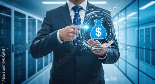 Businessman in data center interacting with a glowing digital money bag hologram representing fintech and investment