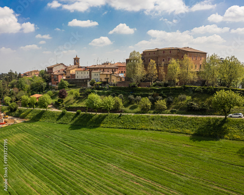 Italy, 10 April 2026: Aerial drone view of Dozza medieval village in Emilia Romagna, featuring the historic Rocca Sforzesca fortress, colorful murals, tiled rooftops, and scenic Italian countryside la