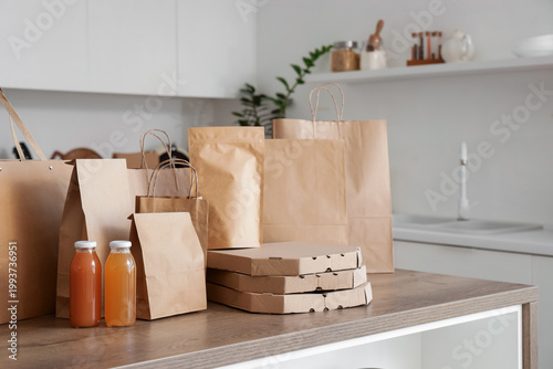 Paper bags with juice on ta...