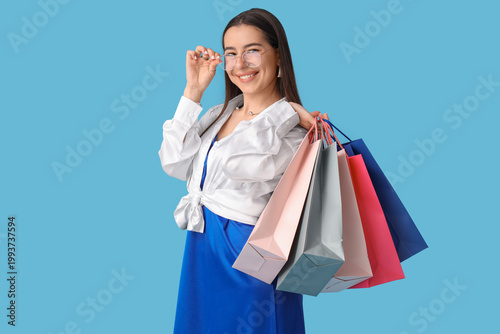 Happy young woman in eyegla...