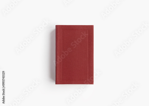 Old vintage hardcover book on white background top view