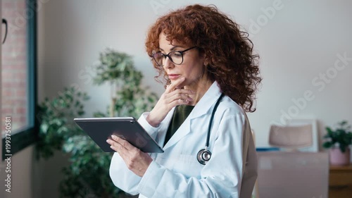 Video of nutritionist woman working with digital tablet in the consultation