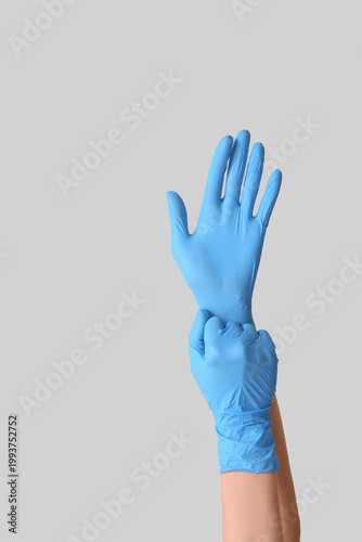 Female doctor putting medic...