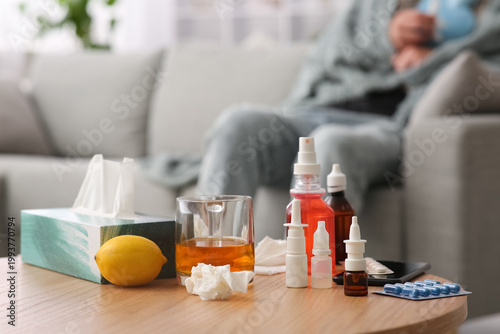 Medicines on table against ...