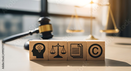 Wooden blocks with of a human head with a lightbulb, a scale of justice, a document, and a copyright symbol next to a judge gavel and balance scales