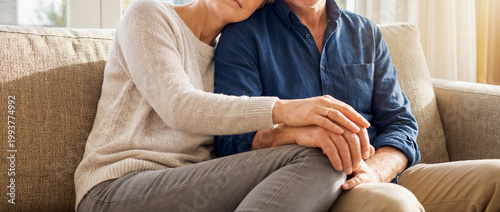 support comfort embrace tenderness cozy home trust connection warmth care seated closeness with hands resting together shows reassurance companionship and safety for home wellness themes