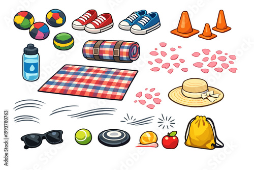 Gathering of picnic items and sports equipment laid out for outdoor activities during a sunny day in the park