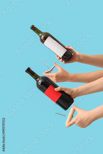 Female hands holding bottle...