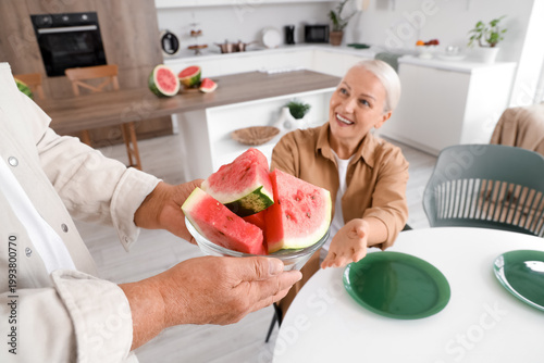 Mature man with slices of f...