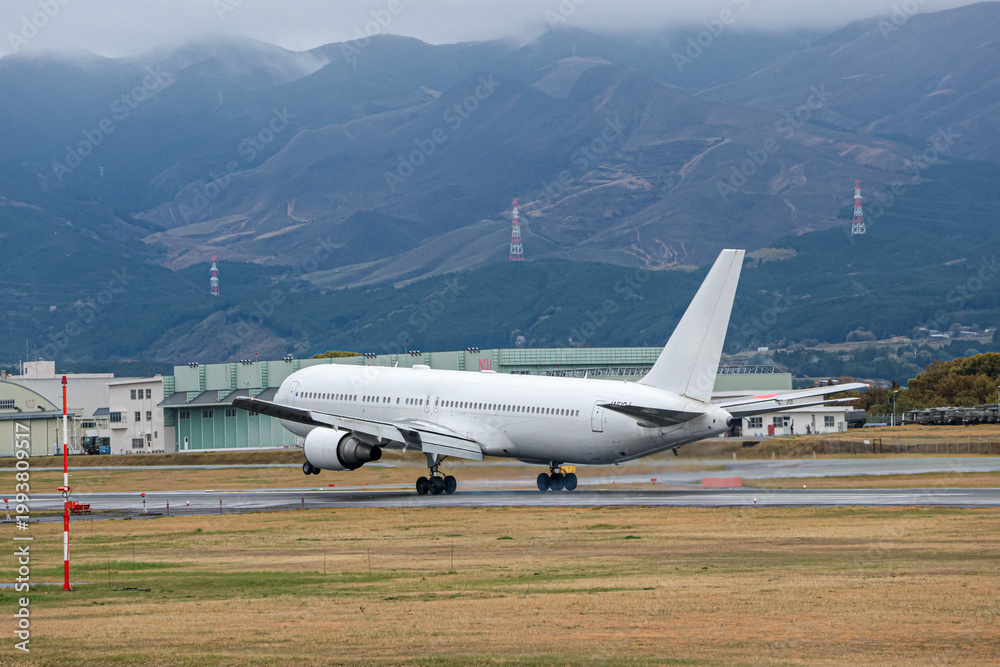 Fototapeta premium A Peaceful Rainy Landscape at Kumamoto Airport in Early Spring