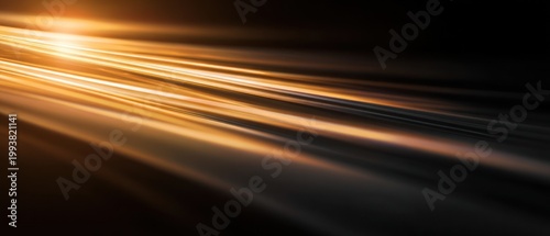 Abstract golden light rays against a dark background dynamic modern design