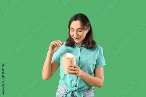 Young woman with french fri...