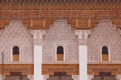 Three central windows of the student rooms above the gallery on the SW side of the central courtyard, Ben Youssef Madrasa. Marrakesh-Morocco-312