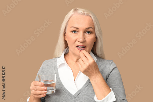 Beautiful mature woman with...