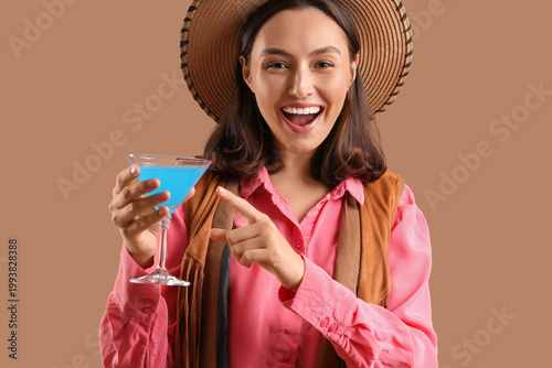 Happy young woman in summer...