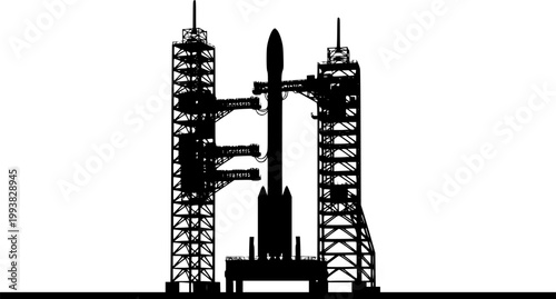 Black silhouette of a rocket on a launchpad with a tower structure isolated on white background
