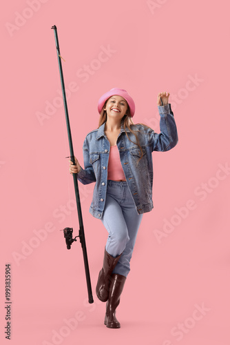 Happy young woman with fish...