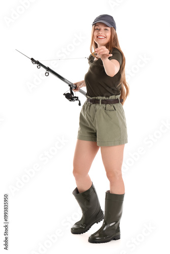 Happy young woman with fish...