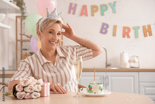 Mature woman celebrating he...