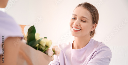 Little girl greeting her mo...