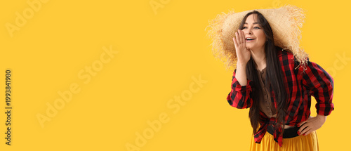 Young happy woman in straw ...
