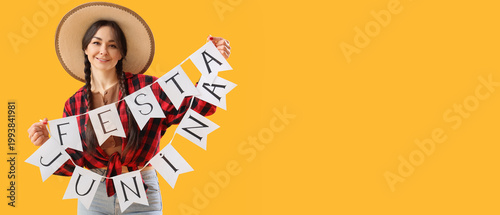 Young happy woman in straw ...