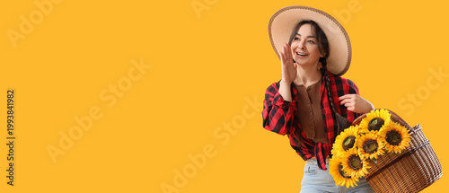 Young happy woman in straw ...