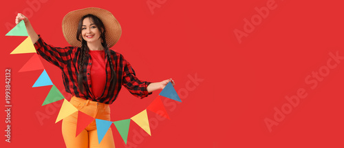 Young happy woman in straw ...