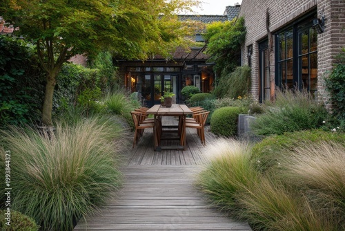 Serene garden patio with wooden deck and dining set, surrounded by diverse greenery