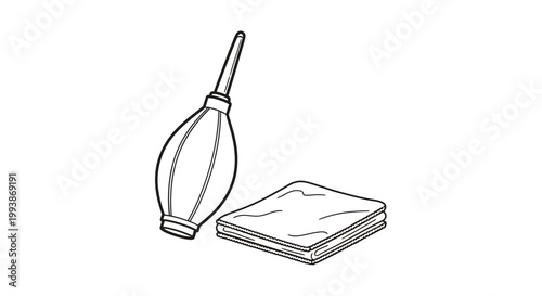 Camera cleaning kit with air blower and microfiber cloth.