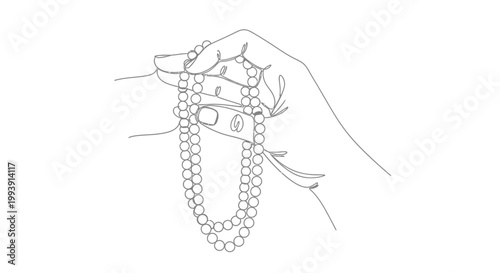 Hand holding pearl necklace jewelry.