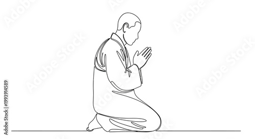 Man in prayer on his knees.